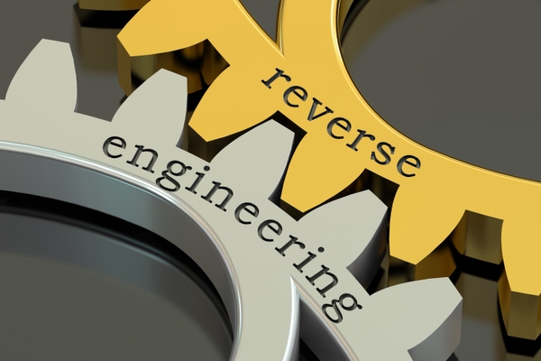 Gears with the words "reverse engineering"